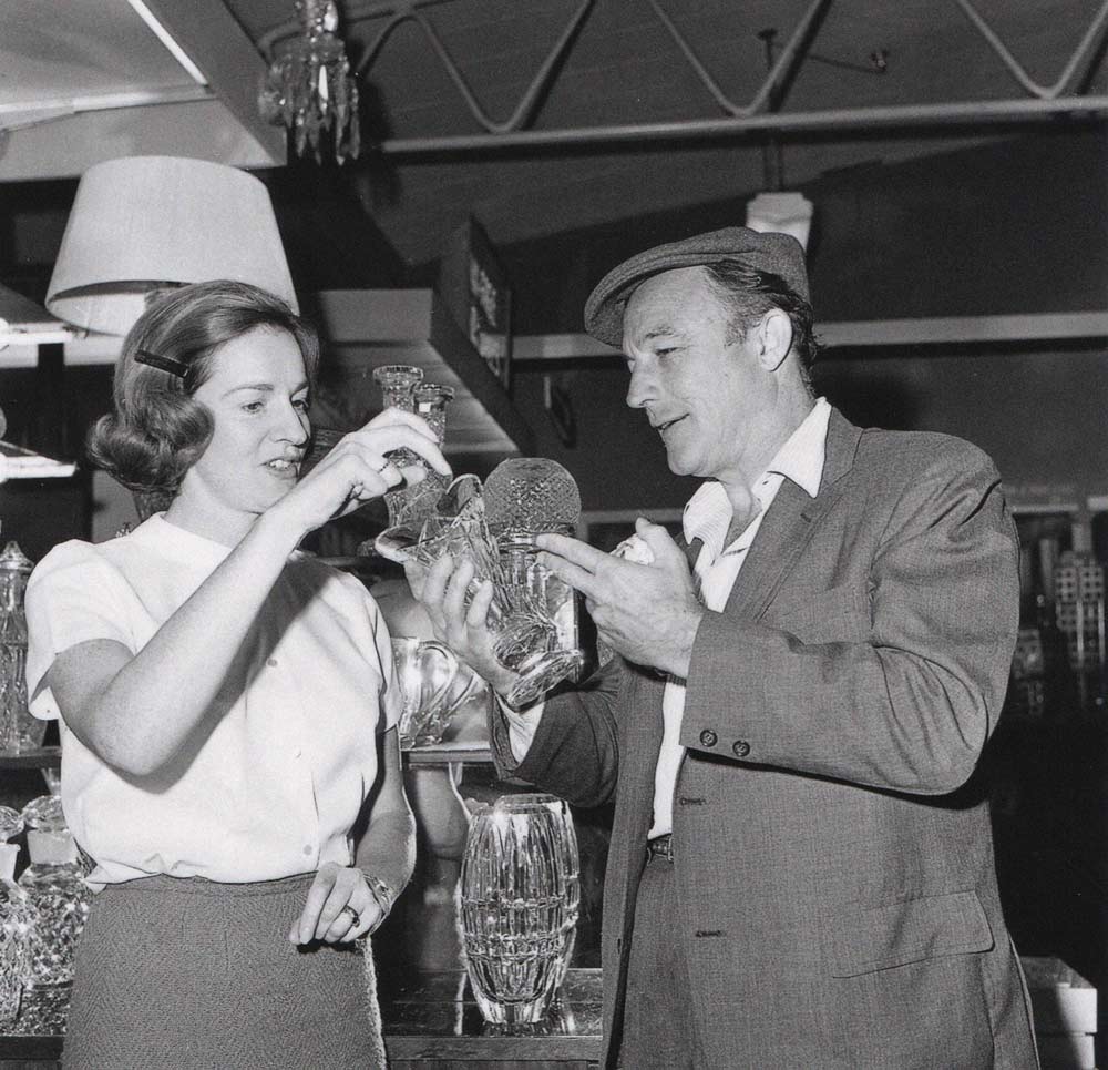 Actor Gene Kelly admires Waterford Glass at Shannon Duty Free-Shop