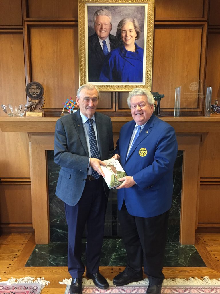 Presentation of Brendan O'Regan biography by Author Brian O'Connell to President of Rotary International Mark Maloney at Rotary HQ in Evanston, Illinois