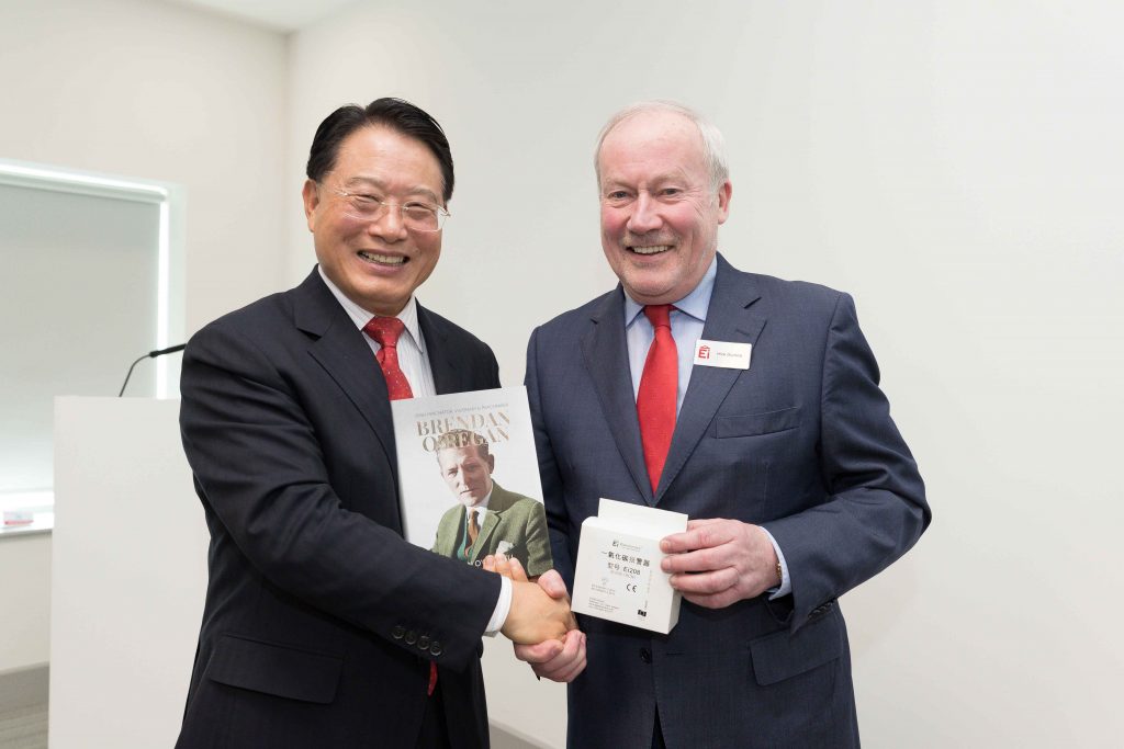 UNIDO Director General, Li Yong is presented with copy of the Brendan O'Regan biography by Ei Ceo Michael Guinee at Shannon Chamber, April 18 2019
